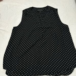 A elegant black with polka dots blouse from smoke and pet free home